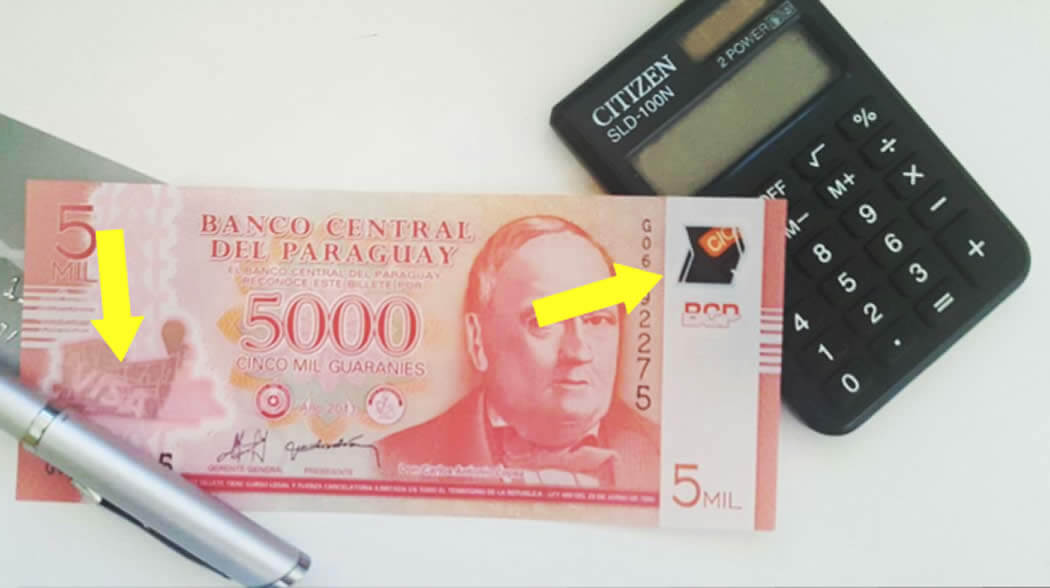 Billete paraguayo de polímero de ₲ 5,000 mostrando zonas de transparencia